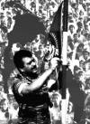 Velupillai Pirabakaran hoisting Tamil Eelam Flag