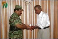 LTTE leader felicitates expatriate language activist
